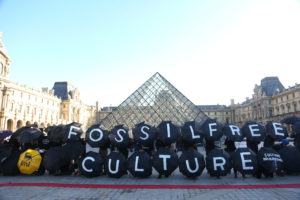 Protest Louvre Museum stop sponsorship from TotalEnergies green is the new black